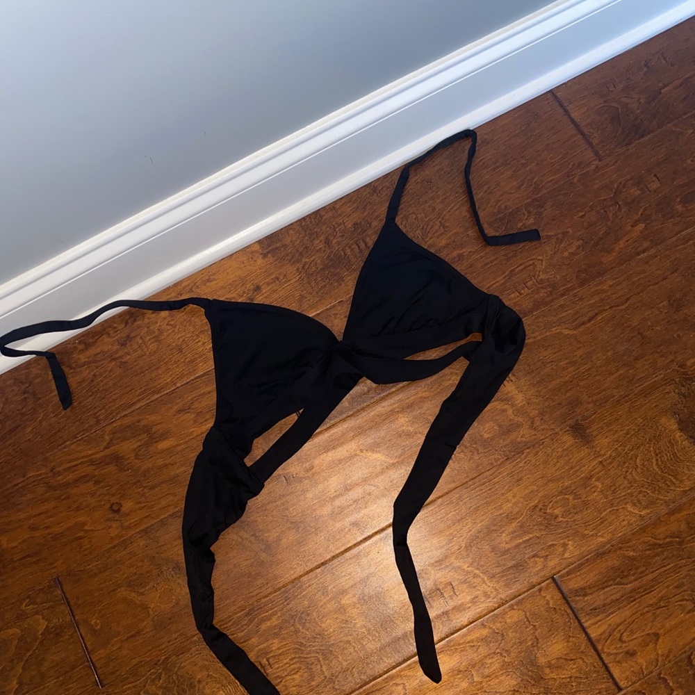 One black bikini top! Worn twice